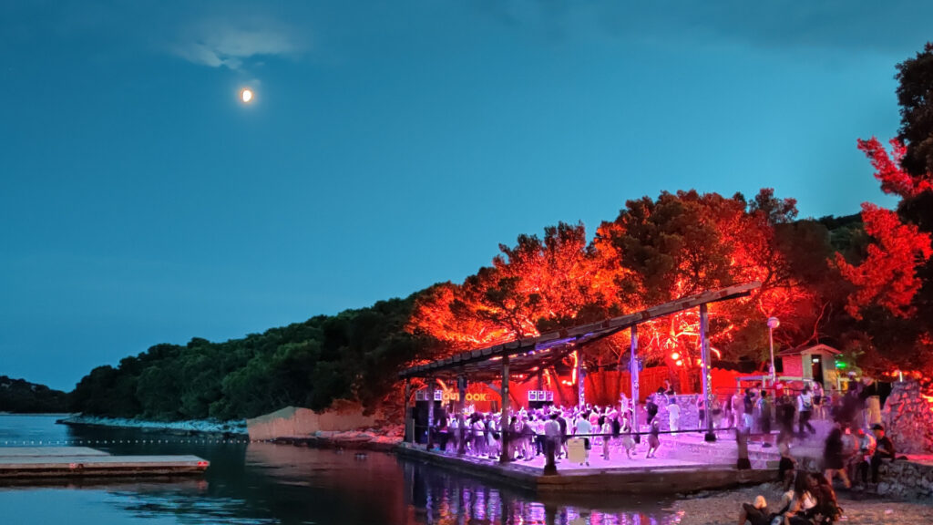 Outlook Origins main stage against sea backdrop